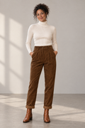 Blythe Corduroy Trousers in Brown, shown on a model