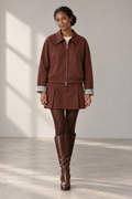 Cora Zip Jacket & Mini Skirt Set in Burgundy Brown, shown on a model