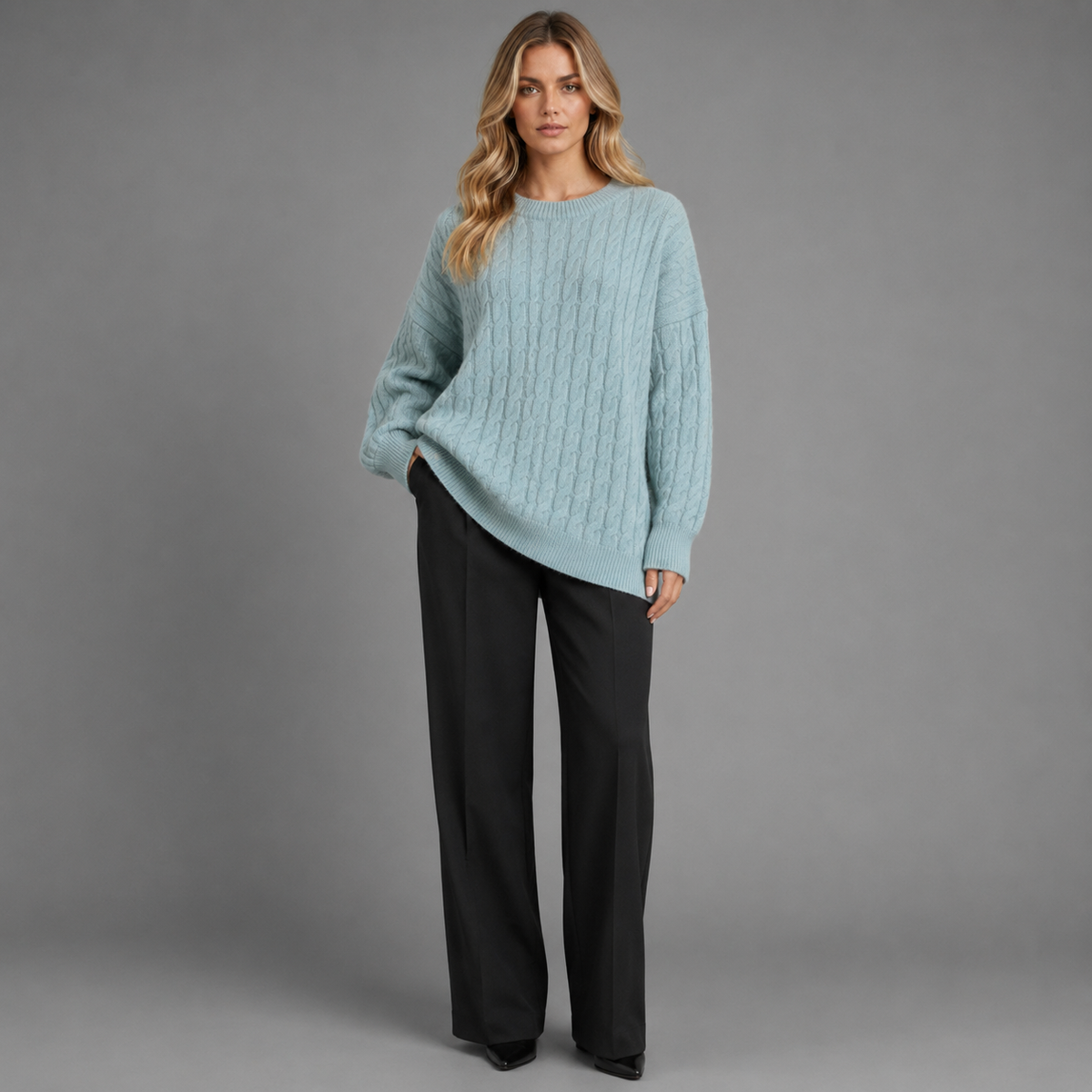 Lodemi mara cable-knit pullover in light blue, front studio view
